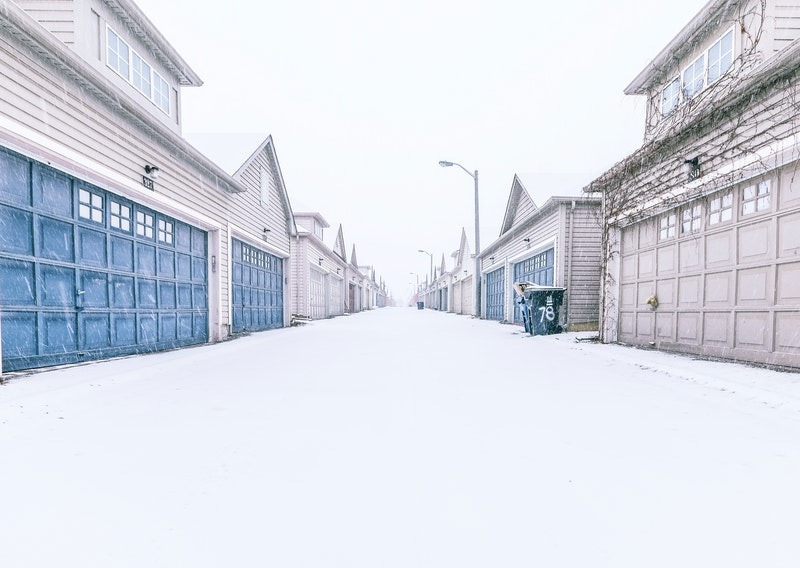 garages on snowy street