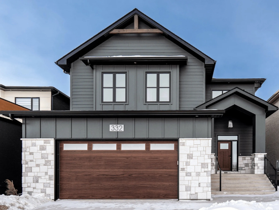 Front view of a home highlighting garage door curb appeal