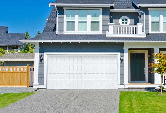 Well-designed garage door matching home architecture and trim
