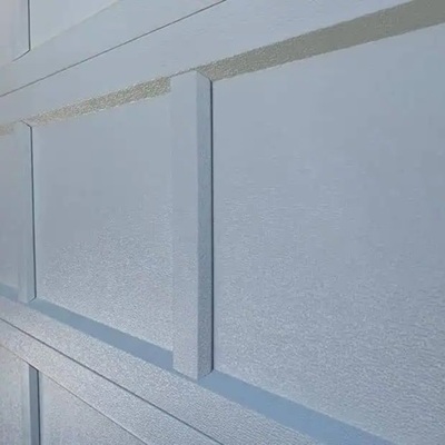 Raised panel short garage door with white finish