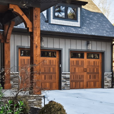 Wood grain door with windows and decorative hardware